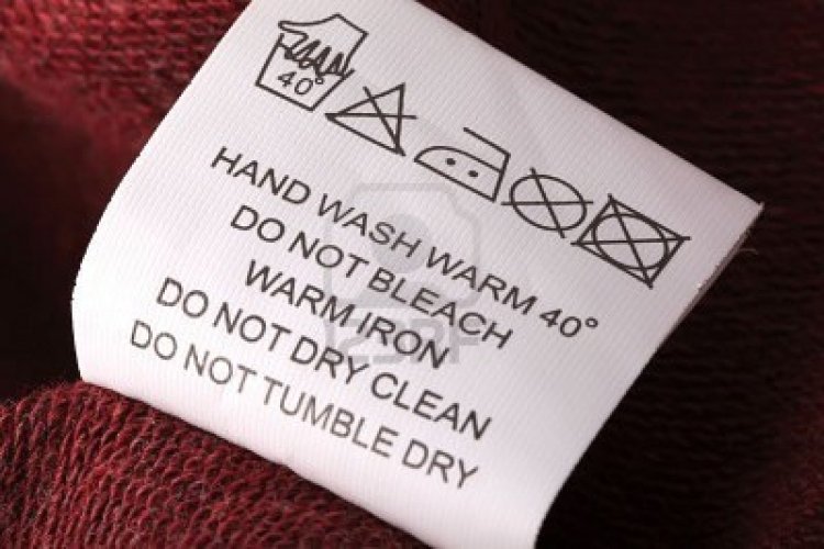 8211903-label-with-laundry-care-symbols-closu-up-shallow-dof