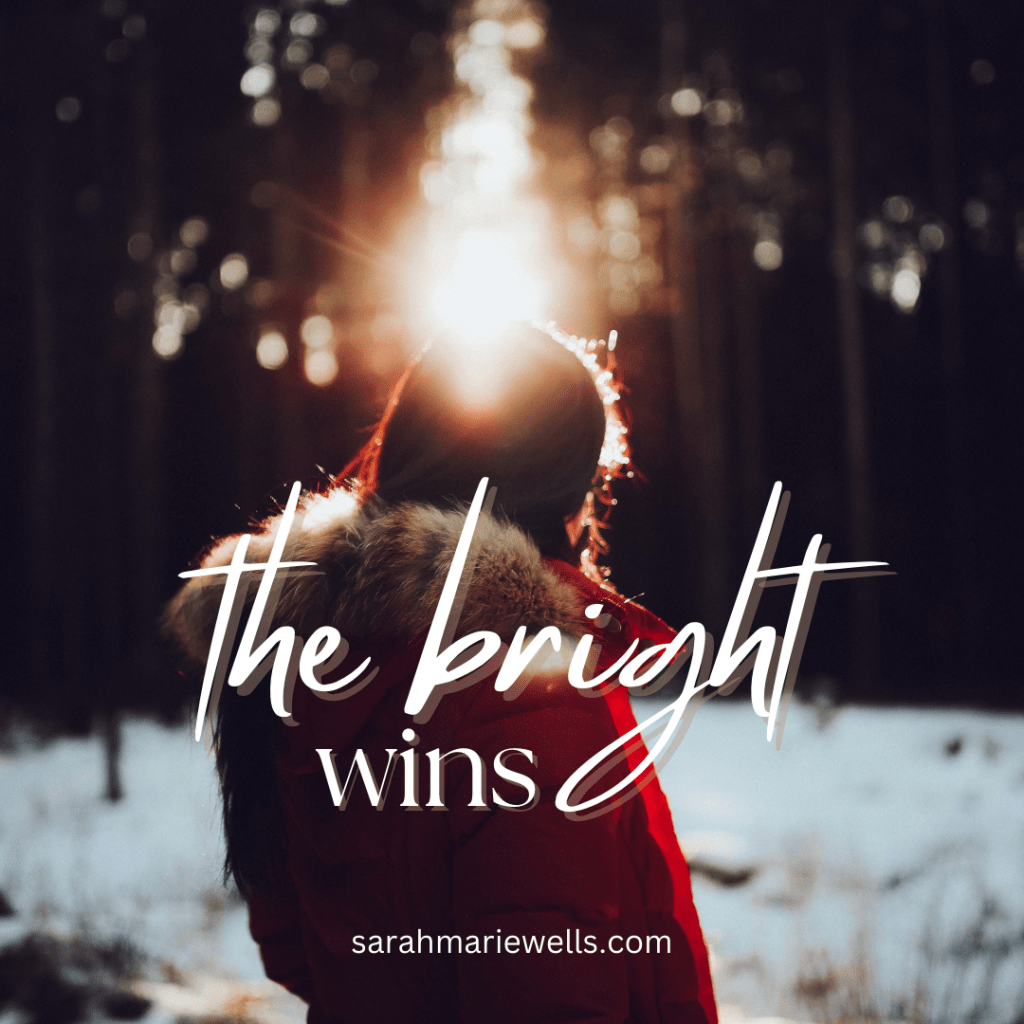 The Bright Wins - sarahmariewells.com - woman staring at the sun through wintry trees